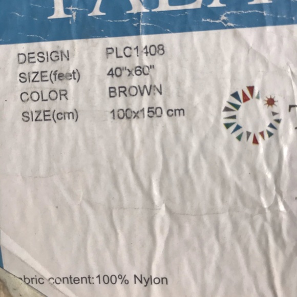 SOLD 40" by 60" patterned rug. Never been used. - Picture 4 of 4